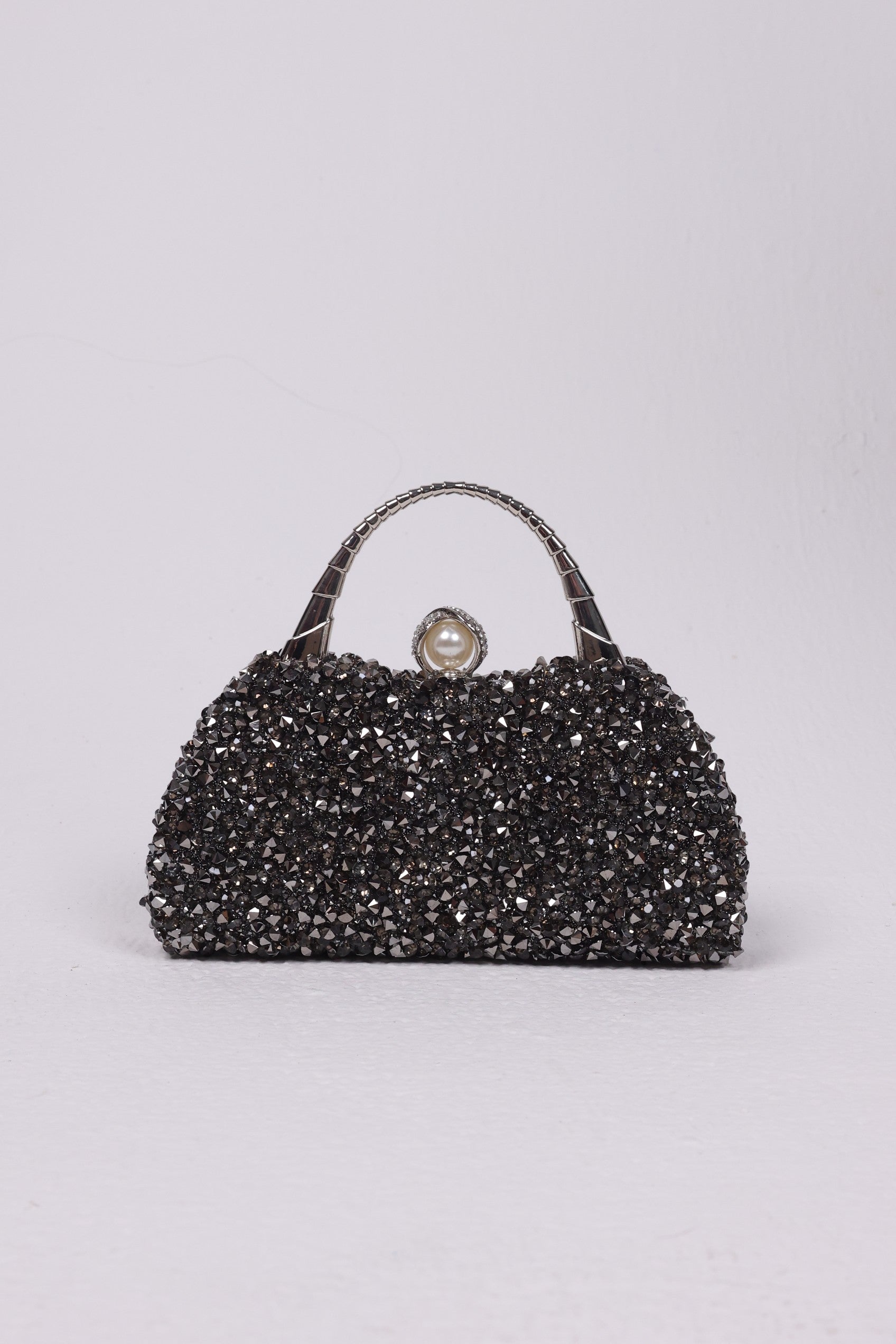 Dazzling crystal studded clutch